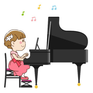 グランドピアノを弾く女の子